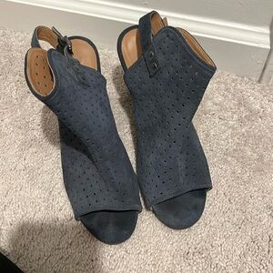 Blue suede ankle booties with open back and peep toe